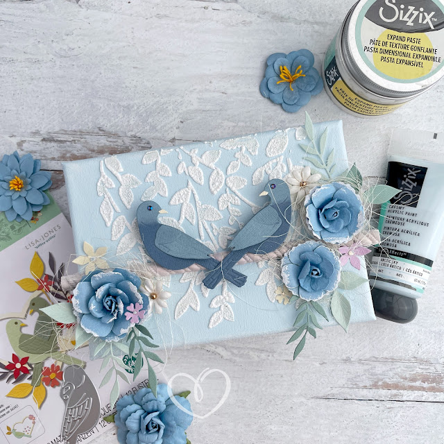 Mixed media canvas created with Sizzix Expand Paste and Sweet Birds Die with Prima Marketing paper flowers.