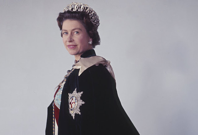 Queen Elizabeth wearing her Garter robes and the Grand Duchess Vladimir's Tiara, made of 15 interlaced diamond circles