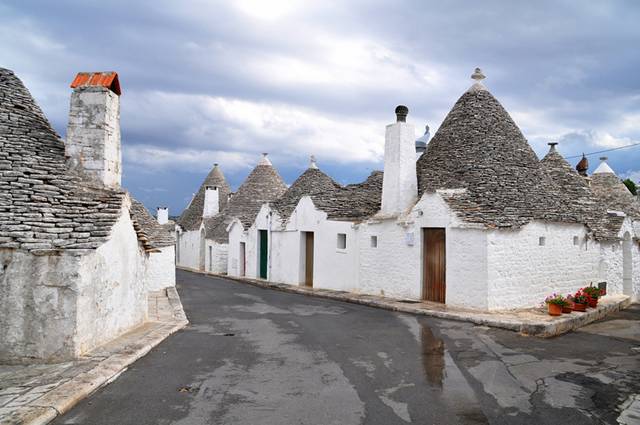 Alberobello, the city of drystone dwellings known as trulli , is an exceptional example of vernacular architecture. It is one of the best preserved and most homogeneous urban areas of this type in Europe. Its special features, and the fact that the buildings are still occupied, make it unique. It also represents a remarkable survival of prehistoric building techniques.