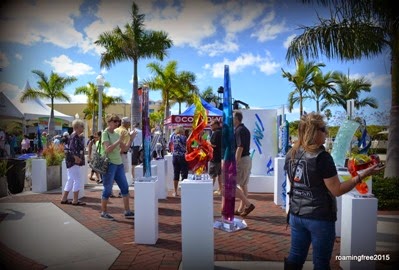 Lots of people admiring the art