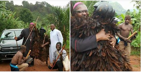 Masquerade Hugs And Poses With A Catholic Priest After They Met On The Road(Photo)