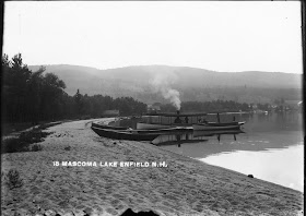 A black and white photograph of Mascoma Lake.