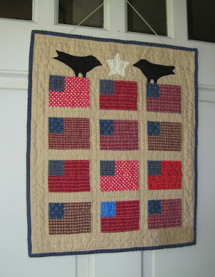 Small primitive flag quilt from a pattern by Cheri Payne