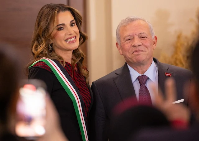 King Abdullah and Queen Rania with a group of women on occasion of International Women’s Day