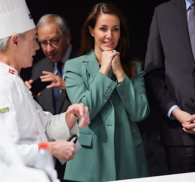Princess Marie wore a new green blazer, suit, by Maje, and green tailored trousers by Maje Paris. Danish chef Brian Mark Hansen