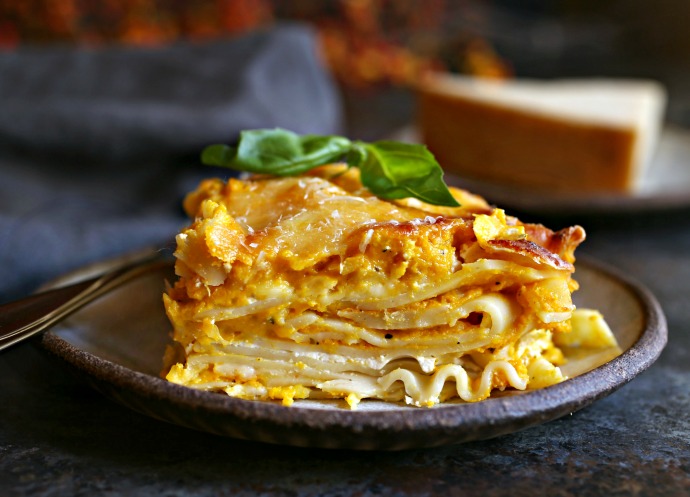 Recipe for lasagna made with a creamy butternut squash and Parmesan bechamel sauce.