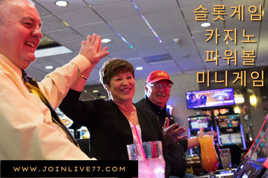 Three senior bettor enjoying playing slot machine at casino