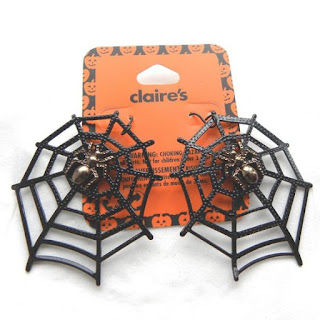 Large black spider web earrings by Claire's Accessories