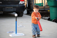 Tyler holding the bat