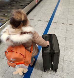 Rosie pushing the bag - she's so helpful