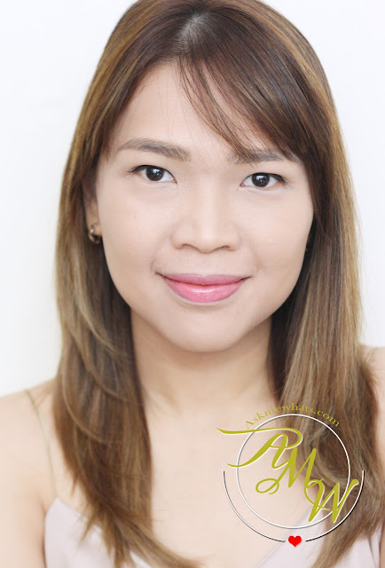 a photo of AskMeWhats Nikki Tiu wearing Celeteque Ultra-Nourishing Lip LacquersSoft Pink