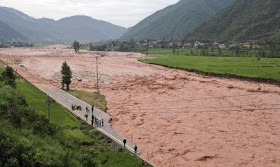 flooded river after heavy rainfall hit Liangshan,