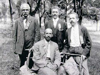 W. E. B. Du Bois (seated), and (left to right) J. R. Clifford (who organized the 2nd meeting), L. M. Hershaw, and F. H. M. Murray at Harpers Ferry