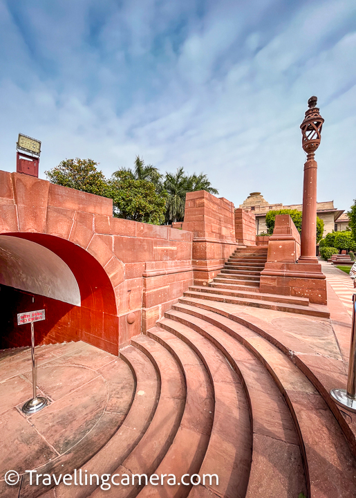 The garden's design is a testament to architectural harmony, seamlessly blending traditional elements with modern landscaping techniques. Delicate pathways wind through the greenery, leading visitors on a contemplative journey.