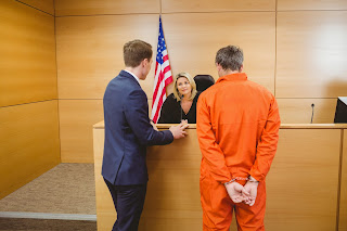 orange jump suit courtroom