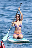 Olivia Wilde on a paddle board in Hawaii