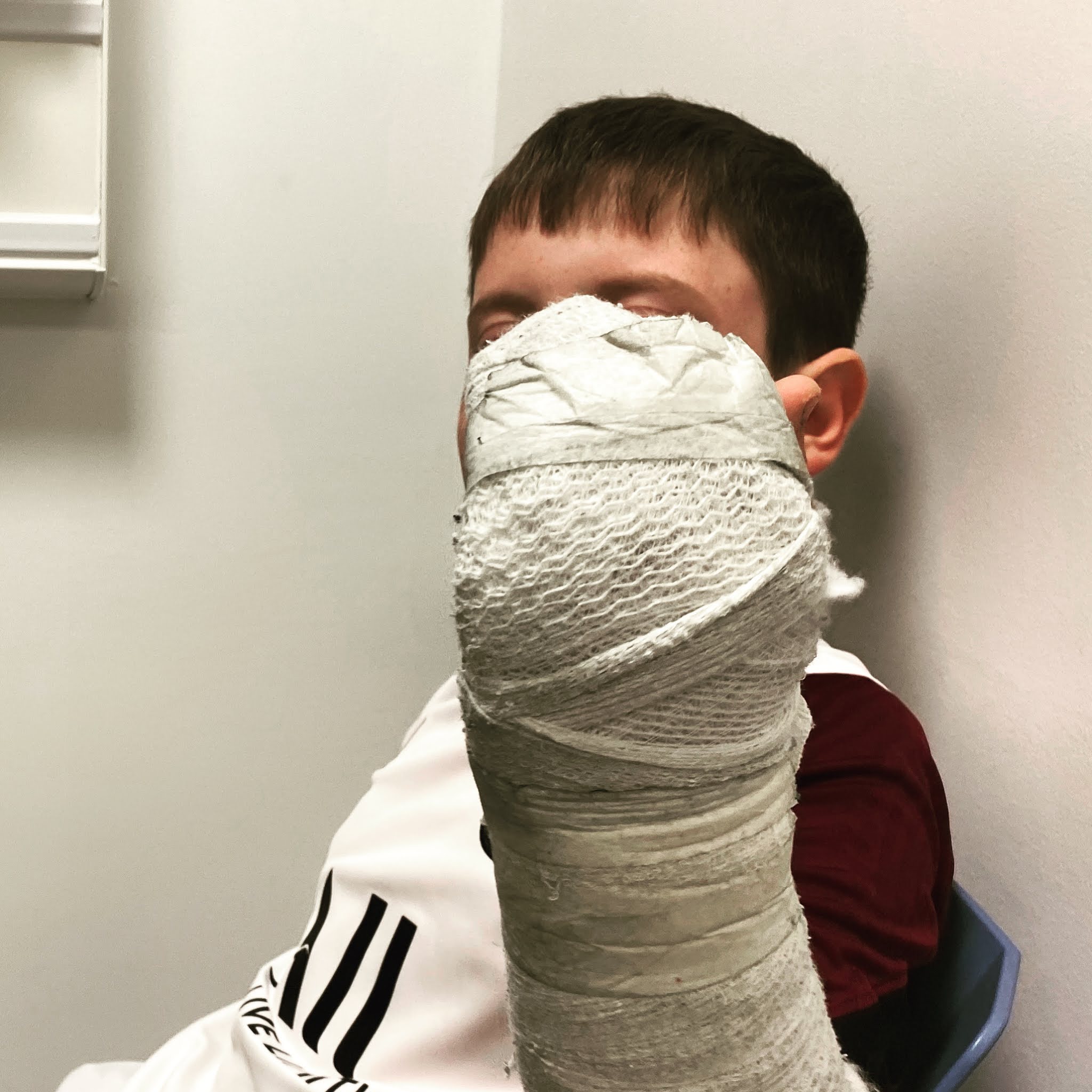 boy with a bandaged arm