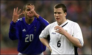 Daid Trezeguet taunts a young Gary Caldwell during Scotland's friendly with France