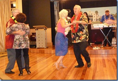 Left: Gordon Sutherland and Joy Eade with residents on the right and the band played on!