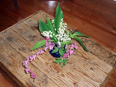 Bleeding Hearts and Lily of the Valley make a colourful bouquet.