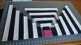 Black and white modern log cabin quilt in Curated Quilts