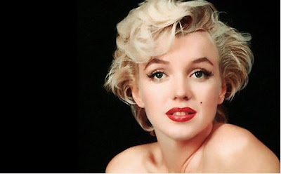 Marilyn Monroe color image with true beauty, true love, wise girl quotes with black background