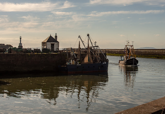 Photo of a trawler bringing home its catch