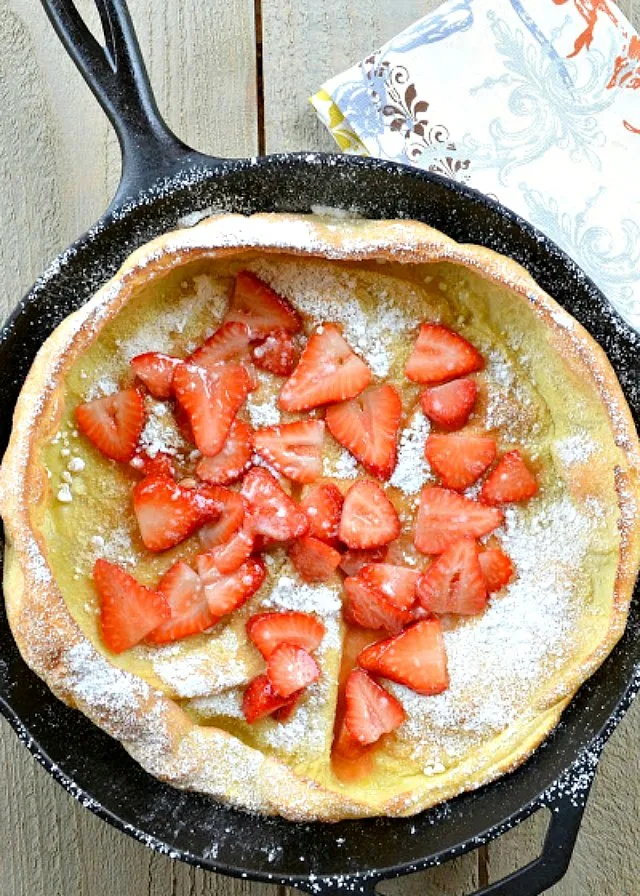 German Pancakes, Dutch Baby Pancakes, or Puff Pancake recipe has been a long time favorite for breakfast or brunch! It's delicious plain dusted with powdered sugar or with fresh fruit from Serena Bakes Simply From Scratch.