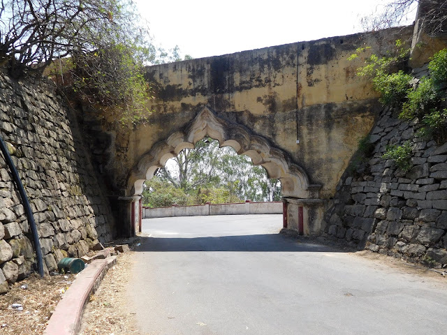 The arched-entrance to the Nandidurg fort, on top of Nandi Hills