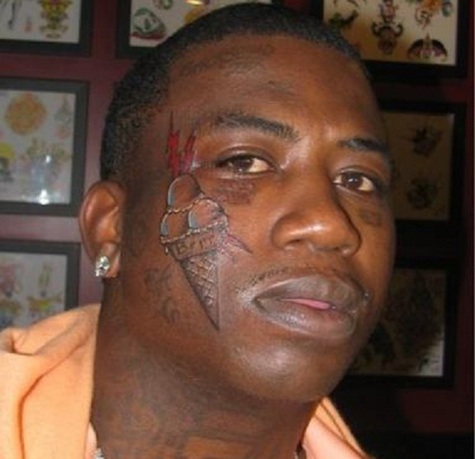 gucci man tattoo on face. Gucci!