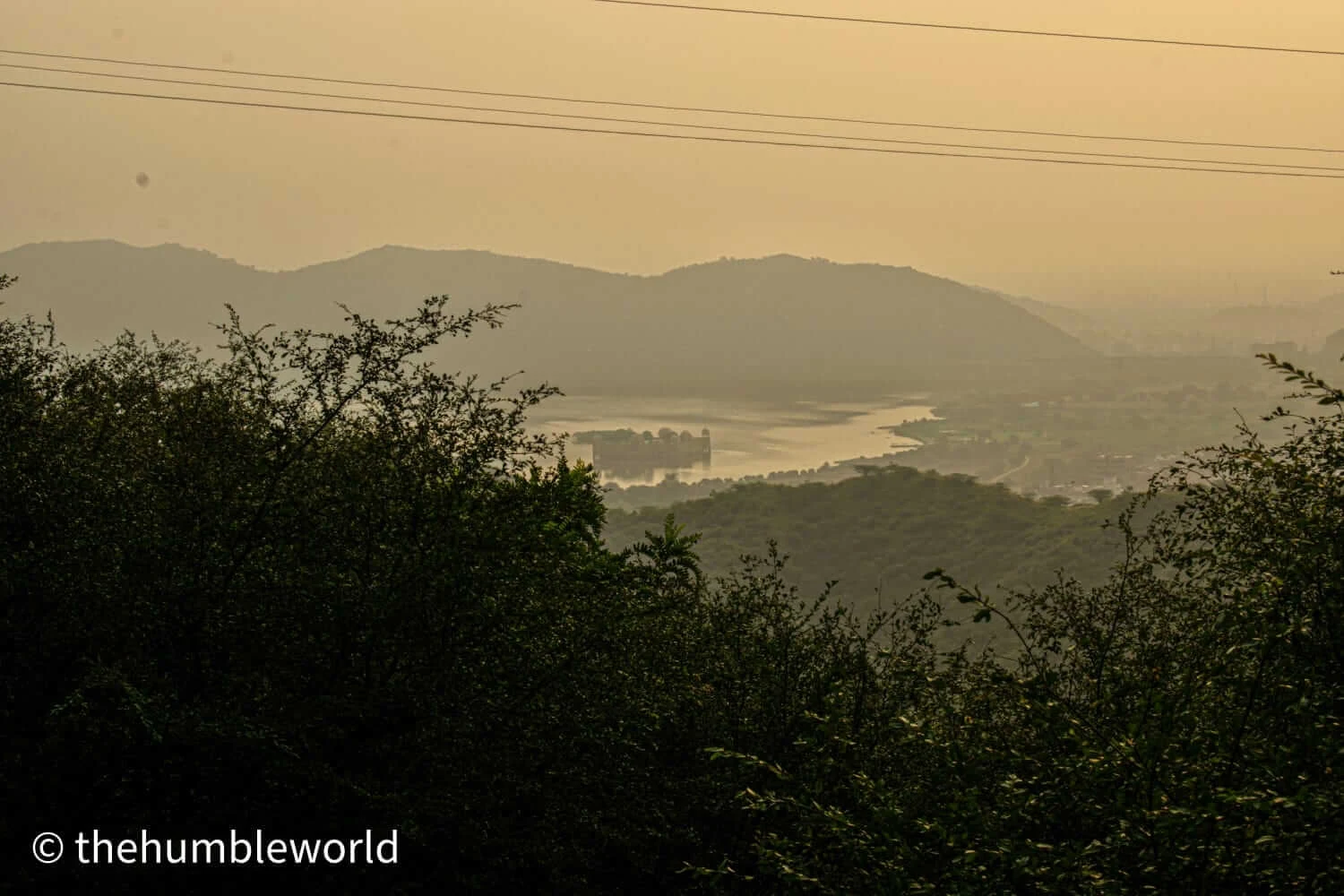 Captured the beautiful view of Jal Mahal peeking out from the bushes from trek view point