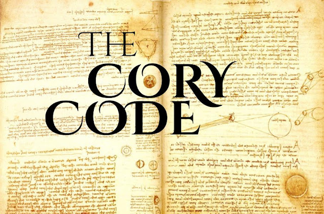 Old parchment with math symbols and cryptic text is visible. The words, 'The Cory Code' are written in a sacred feeling font.