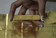 Emas-reuters-tangan-dalam