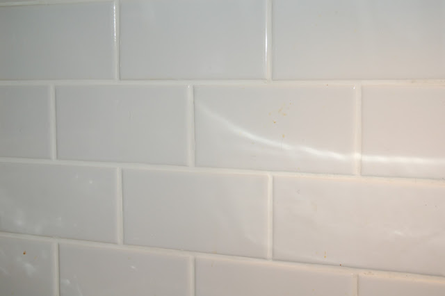 white subway tile with linen colored grout