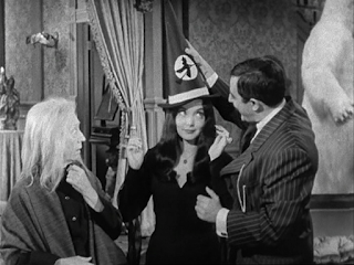 Morticia in witch hat