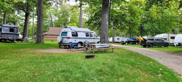 Campervan at spacious campsite.