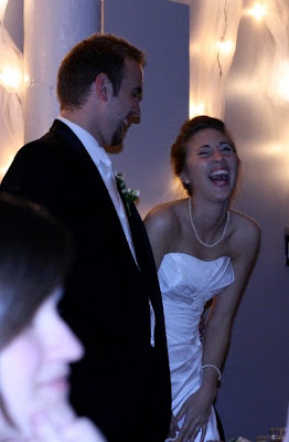 bride and groom reacting to the Thriller dance by the bride's family