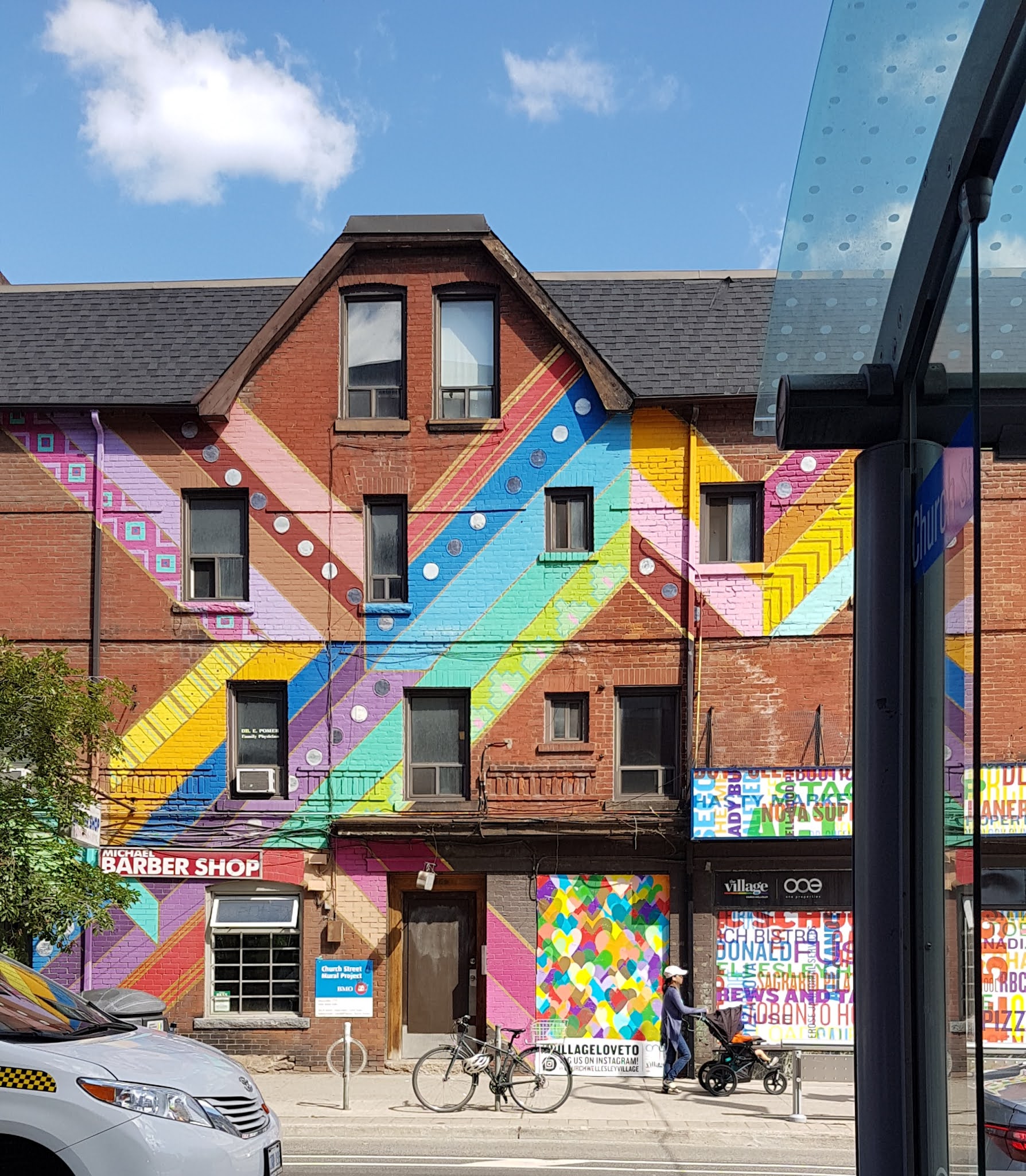 Toronto graffiti rainbow pride painting on building