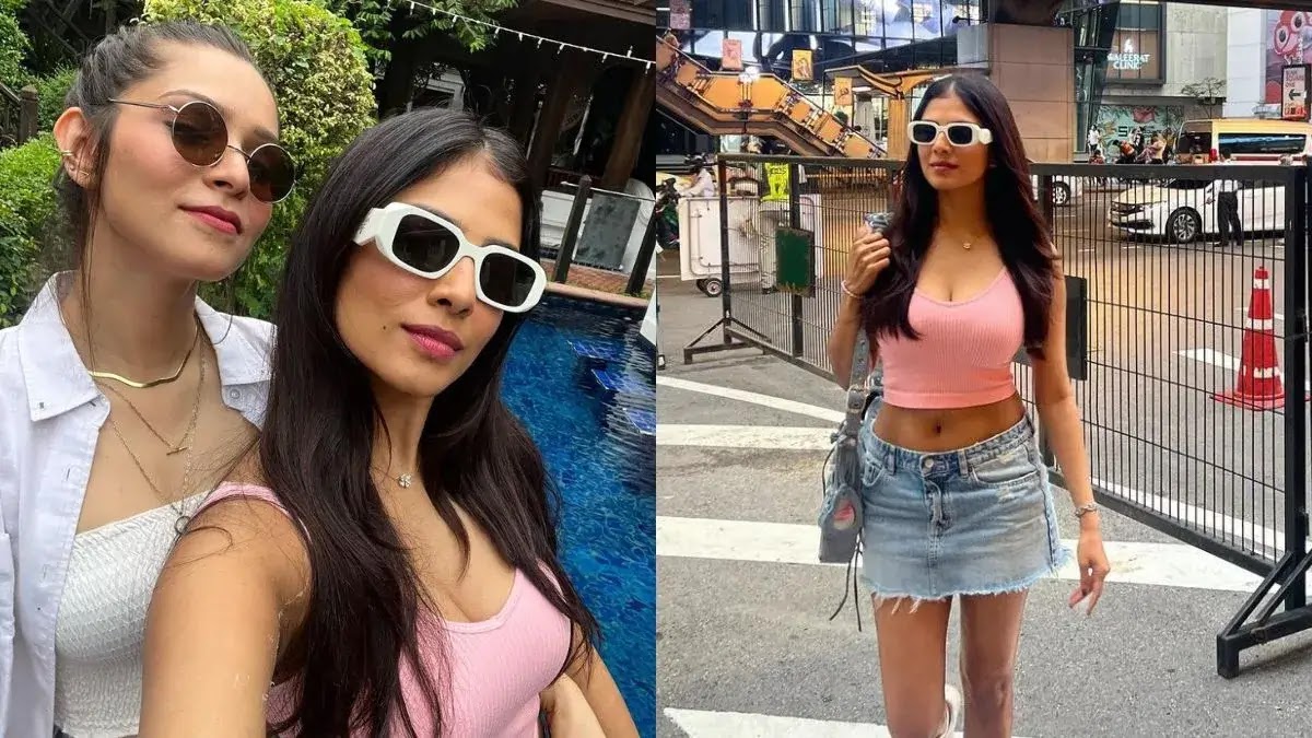 Malavika Mohanan Looks Captivating As She Dolled Up In A Pink Top And Mini Skirt Looks.