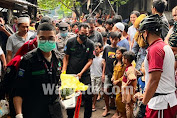 Polsek Sandubaya Evakuasi  Mayat Bayi Yang Terapung di Sungai 