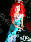 Chloe is excited to wear her Princess Ariel costume for Halloween.