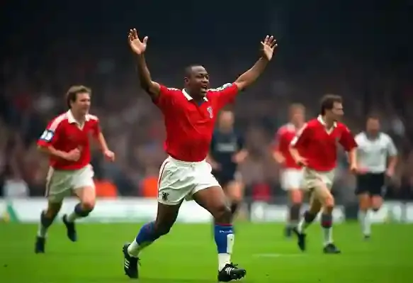 Crystal Palace legend Ian Wright celebrating after scoring a brace in the 1990 FA Cup final against Manchester United, showcasing his poaching instincts and finishing skills.