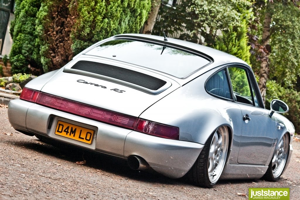 What we have here is a 964series 911 slammed on Rayvern Hydraulics over