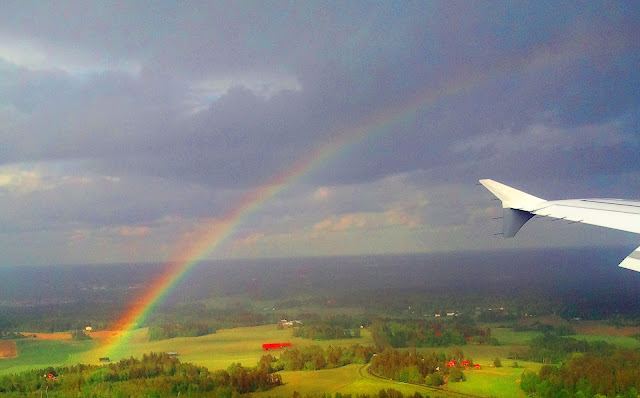 Rainbow from an airplane window