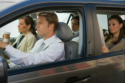 Commuters in a car sharing a ride