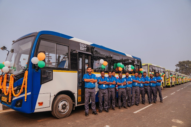 Mo Bus Staff in front of Air Conditioned Mo Bus New Route to Puri
