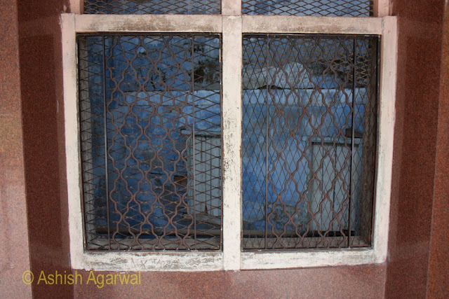 Window in the martyrs well inside Jallianwala Bagh in Amritsar