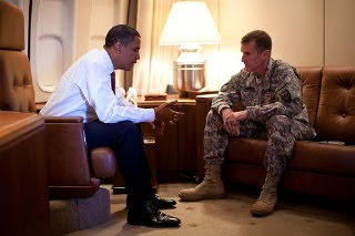 obama meets with killer mcchrystal in denmark