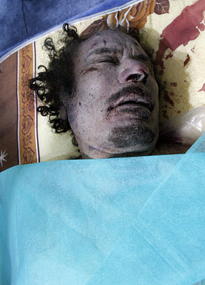 The body of former Libyan leader Muammar Gaddafi is displayed at a ...