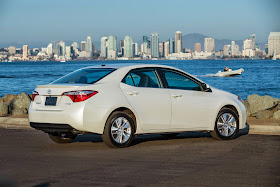 Rear 3/4 view of 2015 Toyota Corolla LE Eco Premium